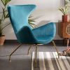 Kave Home Chleo fauteuil in turquoise fluweel met stalen gouden online kopen