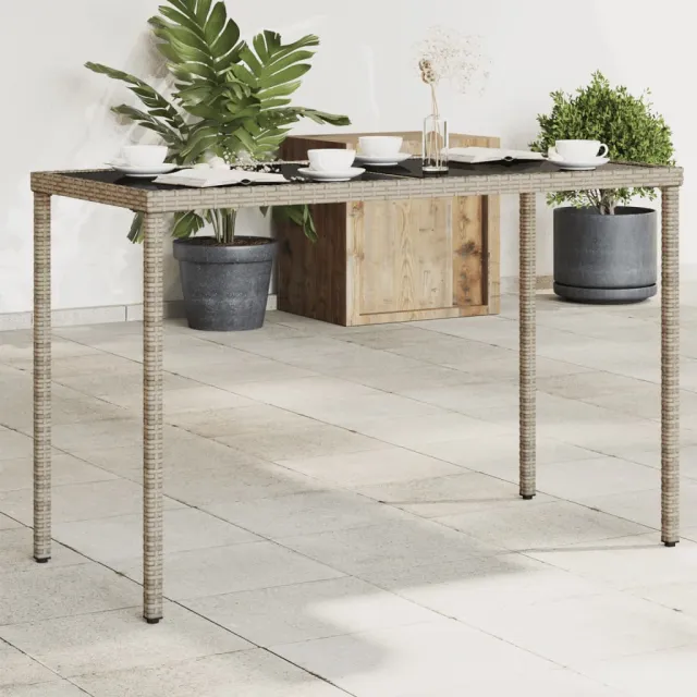 vidaXL Tuintafel met glazen blad 115x54x74 cm poly rattan grijs