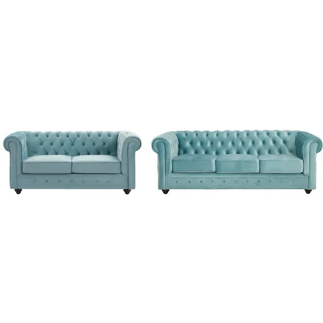 Vente-unique Drie- en tweezitsbank van pastelblauw velours CHESTERFIELD Blauwe lucht