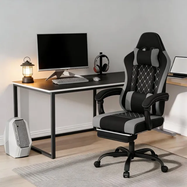 MEUNIQ Ergonomische gamingstoel met massage-lendenkussen, verstelbare hoofdsteun en kantelbare rugleuning voor werkplek en gamekamer - zwart/grijs Zwart en grijs