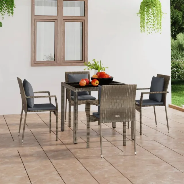 vidaXL Tuinstoelen 4 st met kussens poly rattan grijs