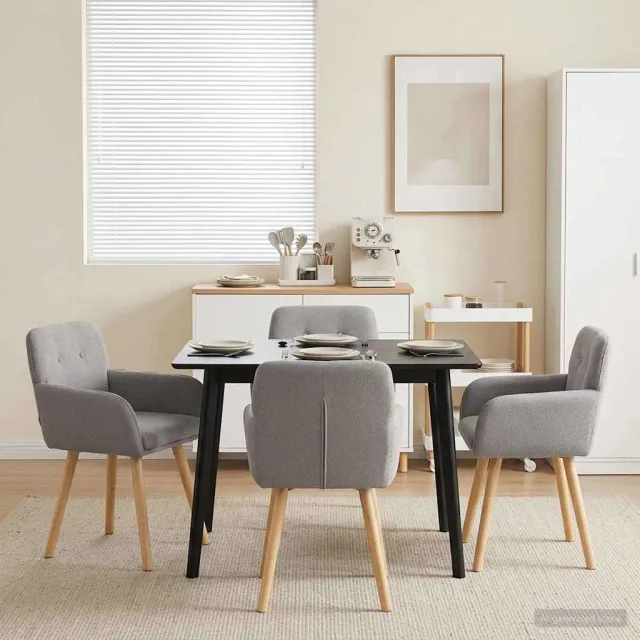 vidaXL Eettafelstoelen 4 st Bouclé Lichtgrijs 59 x 56,5 x 85 cm