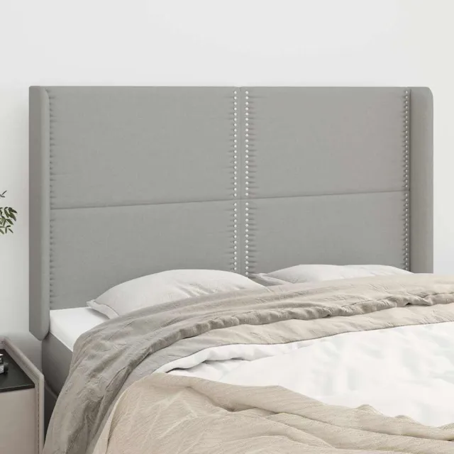 vidaXL Hoofdbord met randen 147x16x118/128 cm stof lichtgrijs grijs