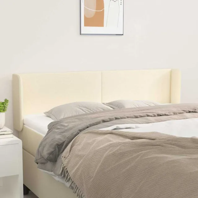 vidaXL Hoofdbord met randen 147x16x78/88 cm kunstleer crèmekleurig