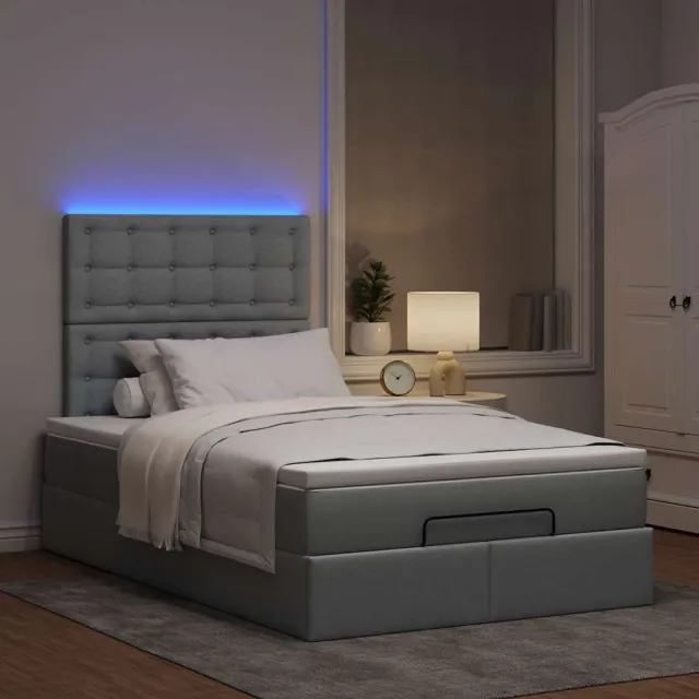 vidaXL Ottoman bed met matras en LED's 120x190 cm stof lichtgrijs grijs